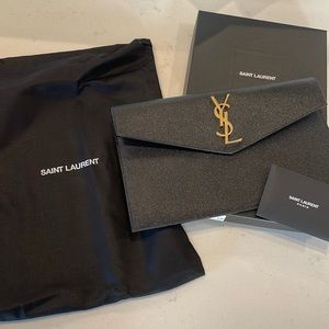 Saint Laurent Embossed clutch